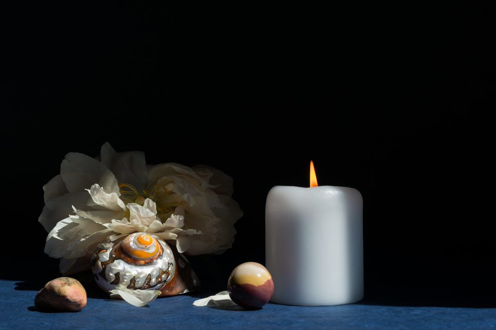 Lighted Candle and Flower